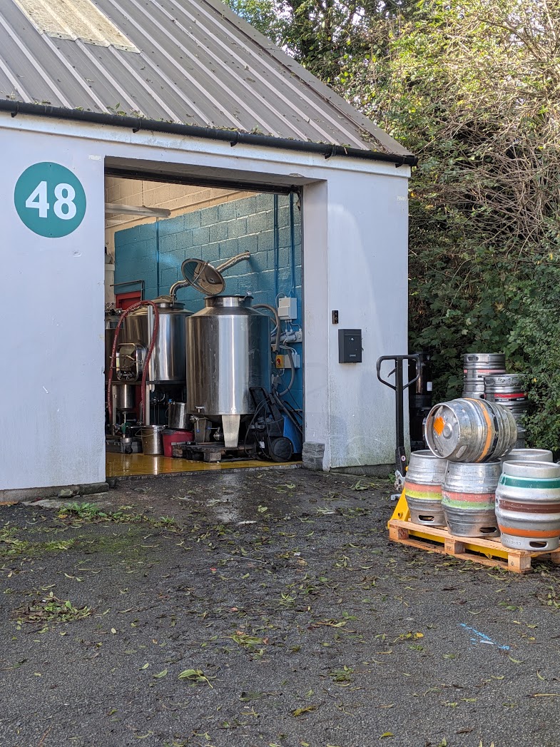 Tidal Range brewery, Unit 48, with brewing kit and casks outside